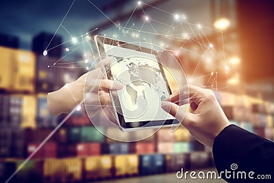 Hand holding tablet is pressing button Logistics connection technology, logistic import export AI generated Stock Photo