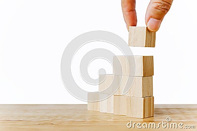 Hand holding the top of stack blank wood cubes with clipping path for infographic icon Stock Photo