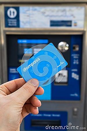 Hand holding a Translink Compass Card Editorial Stock Photo