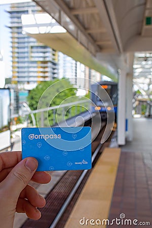 Hand holding a Translink Compass Card Editorial Stock Photo