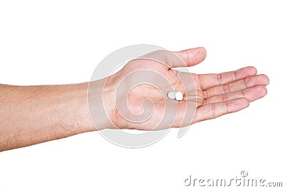 Hand holding two white pills isolate on white background Stock Photo