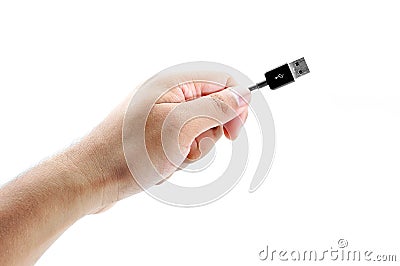 Hand holding USB cable Stock Photo