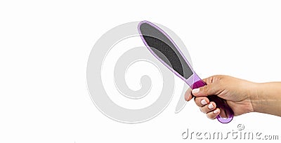 Hand holds foot file - Text space Stock Photo