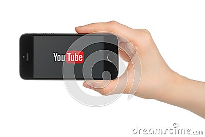 Hand holds iPhone 5s Space Gray with YouTube logo on white background Editorial Stock Photo