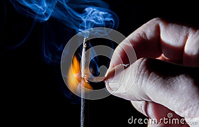 Hand ignition match Stock Photo