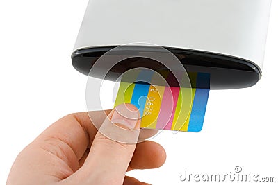 Hand inserting card to reader Stock Photo