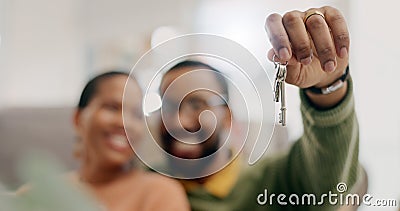 Hand, keys and couple with closeup in new home for fresh start, property or real estate investment with smile. African Stock Photo