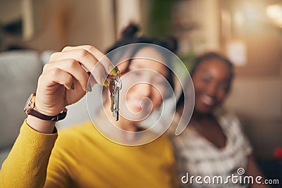 Hand, keys and new home or people moving in together for real estate investment. Rent, mortgage and loan closeup of Stock Photo