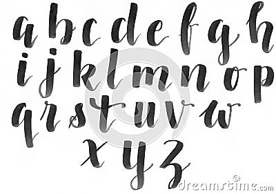 Hand lettering, modern calligraphy alphabet in black on a white paper, handwritten with a personal font Stock Photo