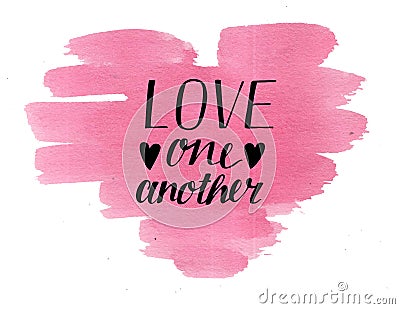 Hand lettering Love one another on watercolor heart. Stock Photo