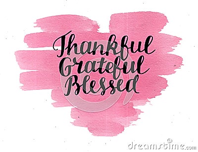 Hand lettering Thankful, grateful, blessed on watercolor heart. Stock Photo