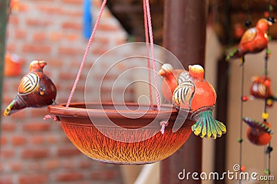 Hand made colorful bird feeder Stock Photo