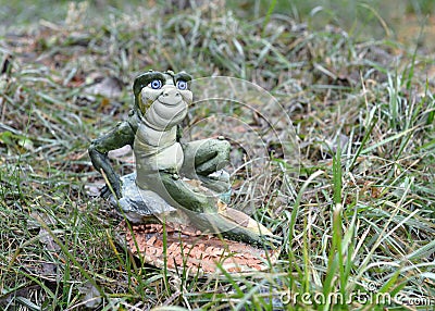 Hand made frog in the grass Stock Photo