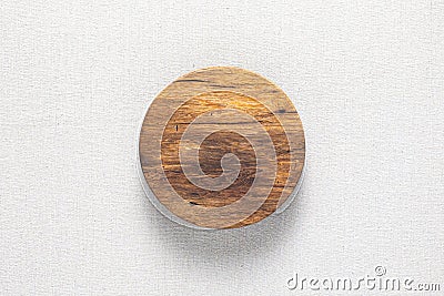 Hand-made round wooden pallets on light-colored linen. Wooden pallet texture background. Wooden plank natural texture background. Stock Photo