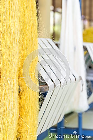 Silk weaving homemade traditional thai fabric Stock Photo