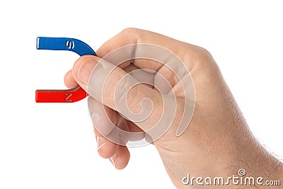 Hand with magnet Stock Photo