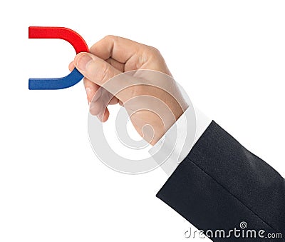 Hand with magnet Stock Photo