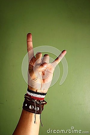 Hand making a rock and roll sign Stock Photo