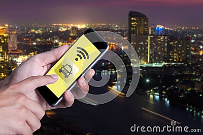 Hand of man using smartphone call taxi by application smartphone Stock Photo