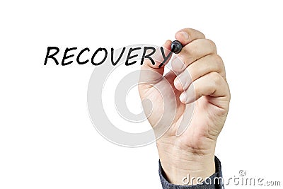 Hand of man writing the word Recovery on a transparent board Stock Photo