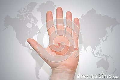 Hand with map of mongolia on the gray world map background Stock Photo