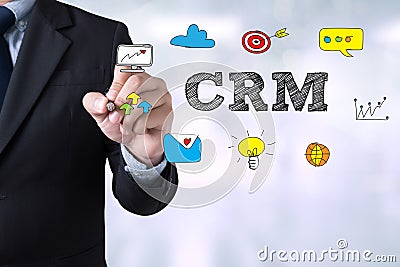 Hand with marker writing: CRM Stock Photo