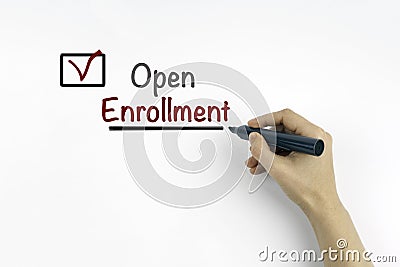 Hand with marker writing: Open Enrollment Stock Photo