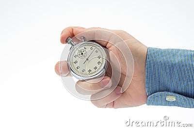 hand with a mechanical analog stopwatch on a white background. Time part precision. Measurement of the speed interval Stock Photo