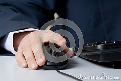 Hand on mouse Stock Photo