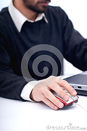 Hand on mouse Stock Photo