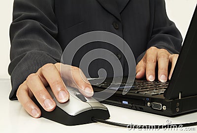Hand on mouse Stock Photo