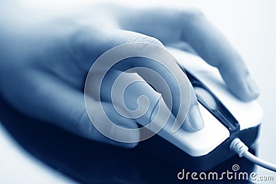 Hand on mouse Stock Photo