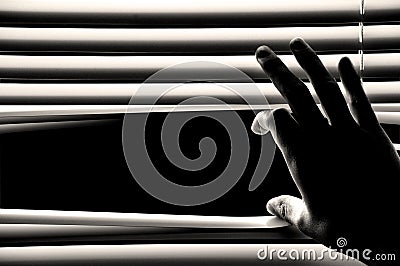 Hand opening windows blinds Stock Photo