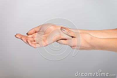 Hand Pain. Closeup Beautiful Female Hands With Painful Feeling Stock Photo