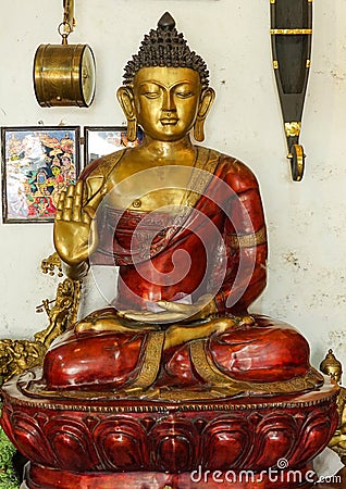 Hand painted bronze sculpture of a Buddha statue in one of the many antique shops in the Fort Cochin, Keral Editorial Stock Photo
