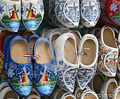 Original hand painted klompen (wooden shoes) with flags and mills, Amsterdam, Netherlands Stock Photo