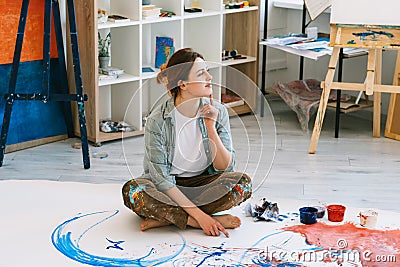 hand painting art therapy inspired female artist Stock Photo