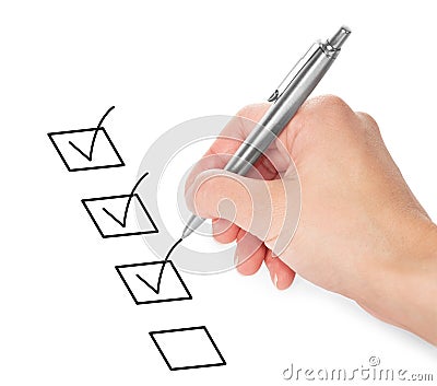 Hand with pen and check boxes Stock Photo