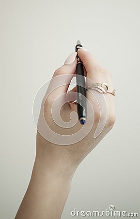 Hand with pen Stock Photo