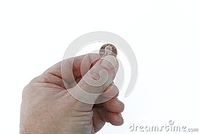 Hand with penny pinching Stock Photo