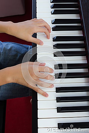 Hand and piano Stock Photo