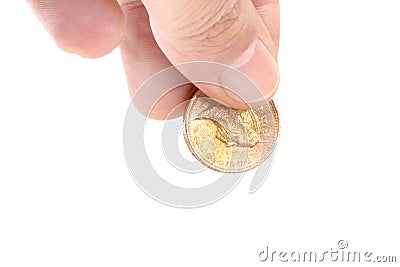 Hand picking a coin Stock Photo