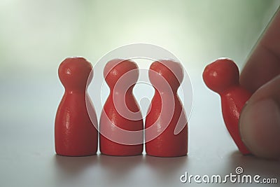 Hand picking on one talent, Human resources concept. Stand out from the crowd Stock Photo