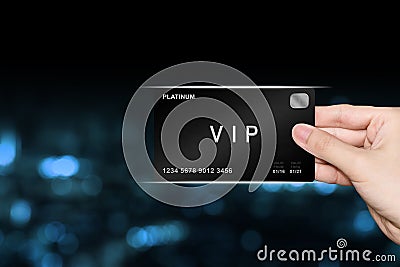 Hand picking VIP or very important person platinum card Stock Photo