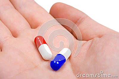 Hand and pills Stock Photo