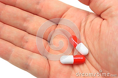 Hand with pills Stock Photo