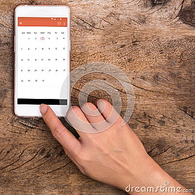 Hand pointing smartphone Stock Photo