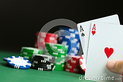 Hand with poker aces Stock Photo