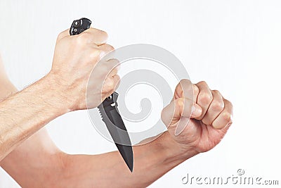 Hand position to attack with a combat knife Stock Photo