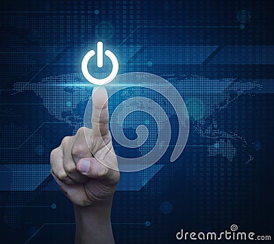 Hand pressing power button over digital world map technology sty Stock Photo